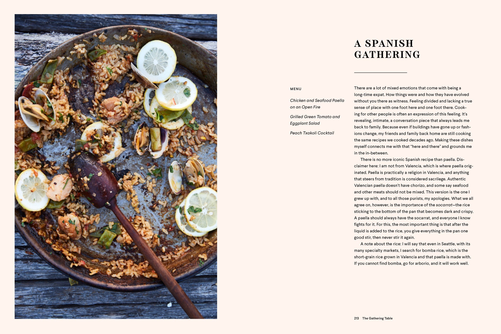 'Cannelle et Vanille Bakes Simple'  Plated dish with a wooden spoon on a rustic surface, accompanied by text about a Spanish gathering.