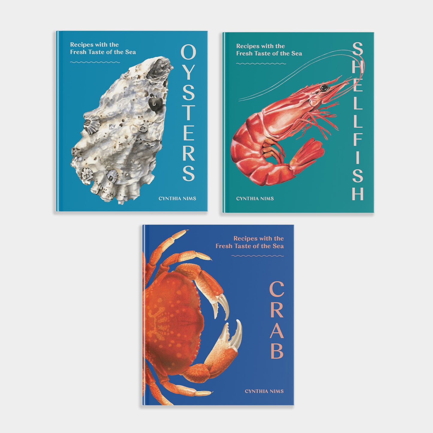 Three cookbooks on shellfish, oysters, and crab with illustrations on a white background.