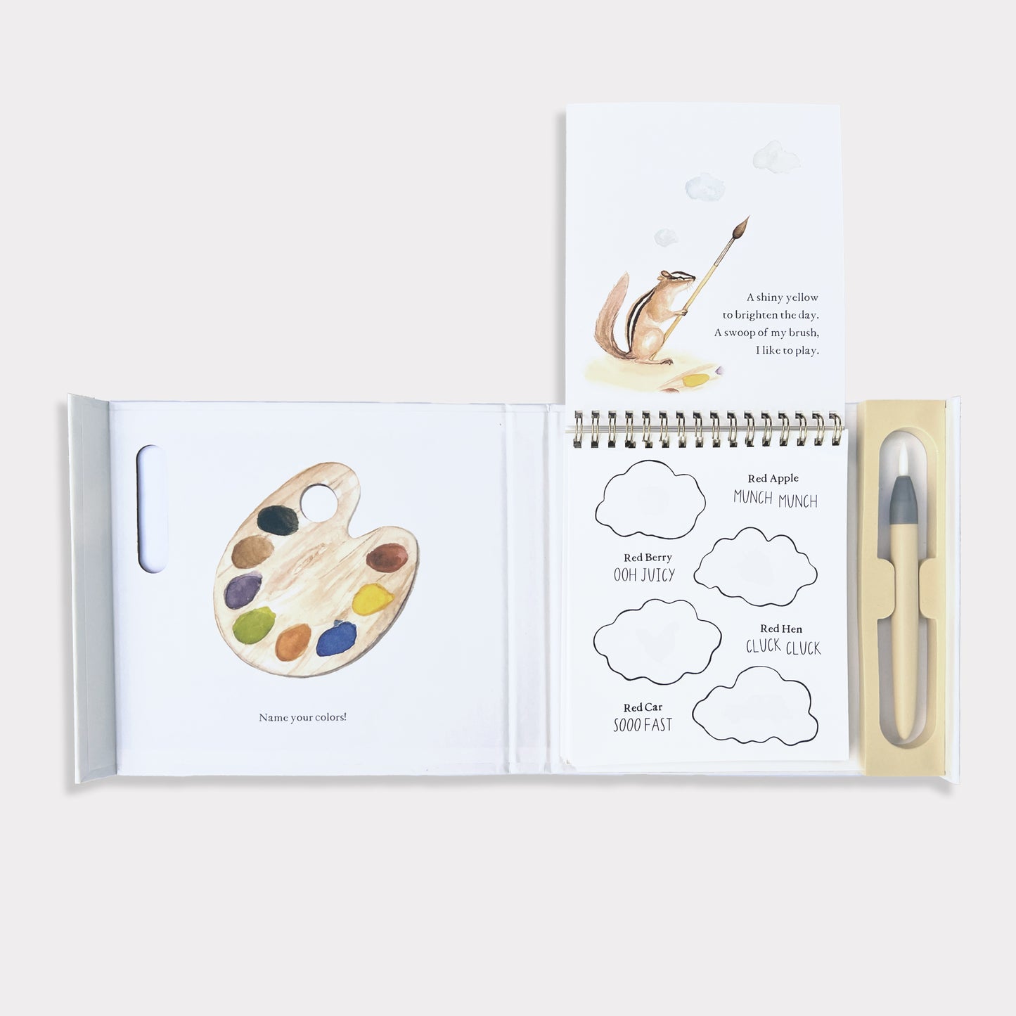 Wishy Washy Water Reveal Book with art supplies and coloring activities on a white background