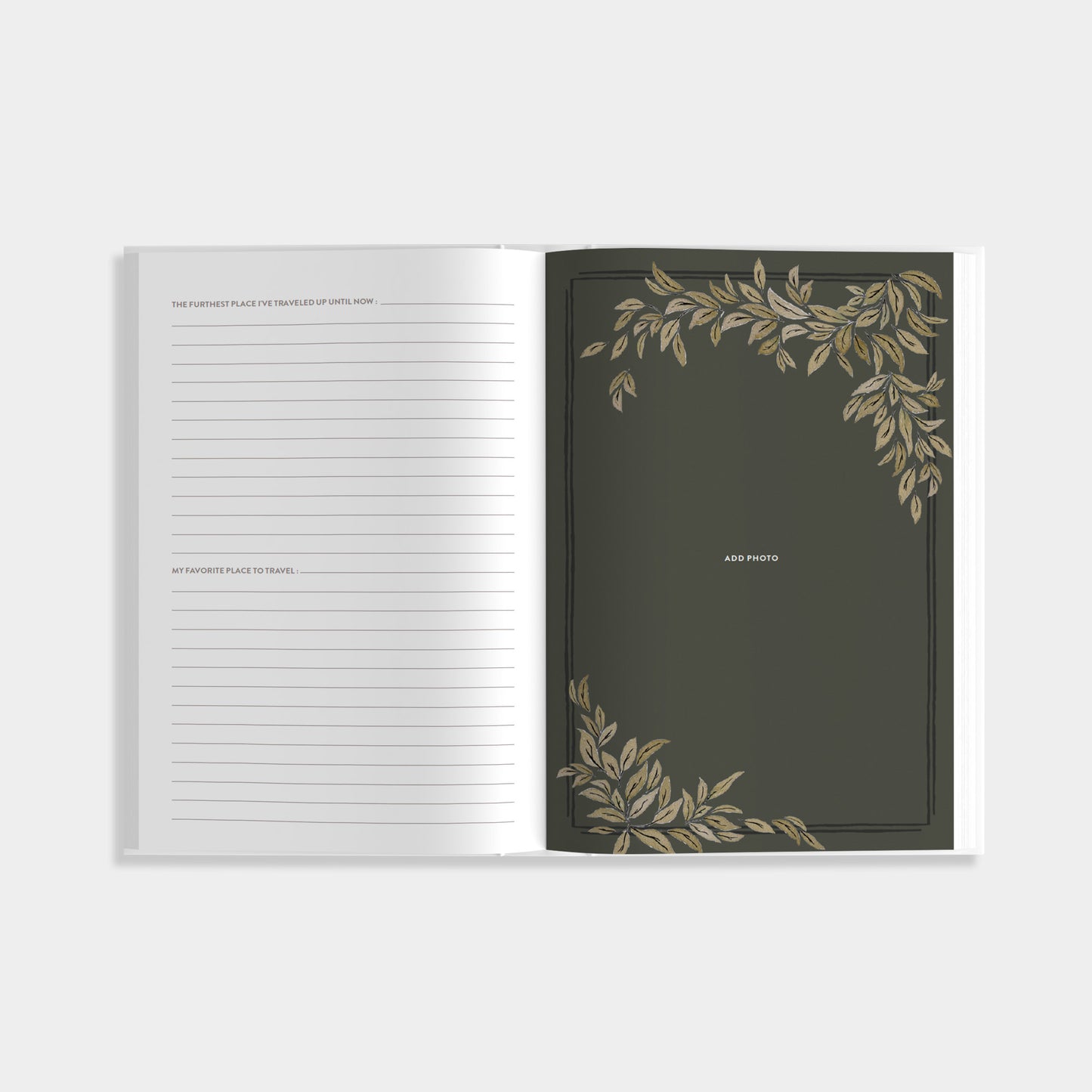 Open notebook with lined pages and decorative leaf patterns on a white background