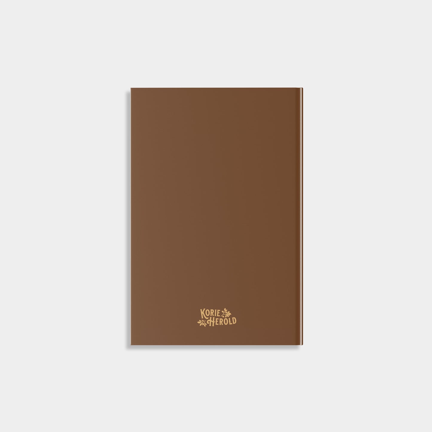 Brown notebook with a brand logo on a white background