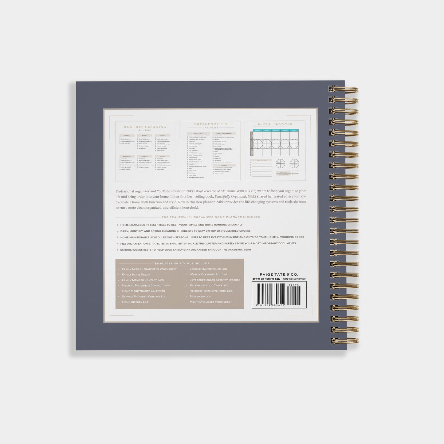 Back cover of a spiral-bound notebook or planner in a muted blue-gray color, showing printed text, a small chart, and a barcode, with a gold spiral binding on a light gray background.