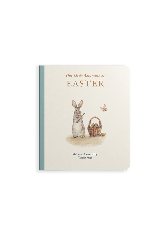 Book titled 'Our Little Adventure at Easter' with an illustration of a rabbit and basket on a white background
