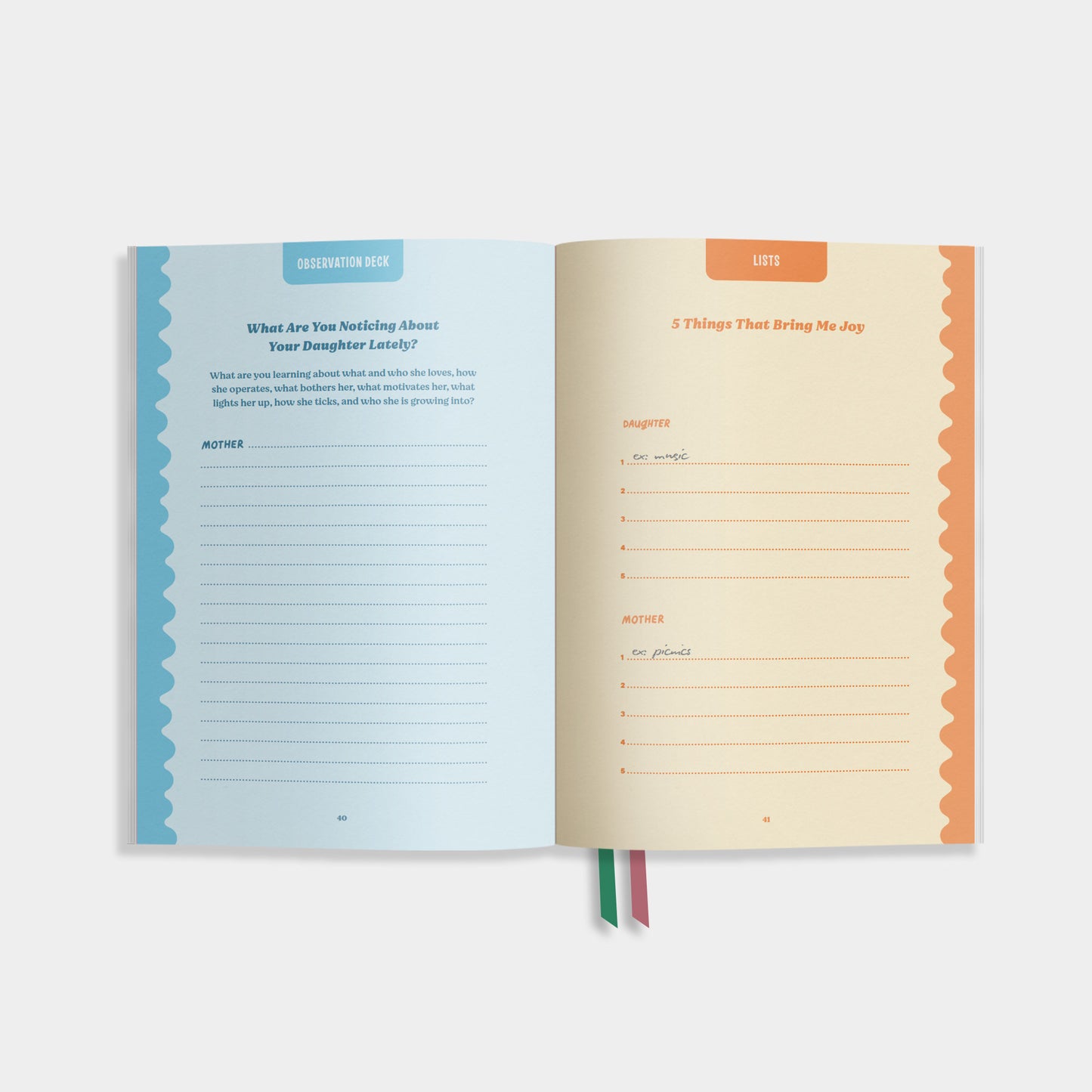 Open notebook of 'Uniquely Us' showing a blue and beige page with text and lists.