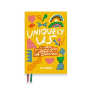 Colorful journal titled 'Uniquely Us' on a white background