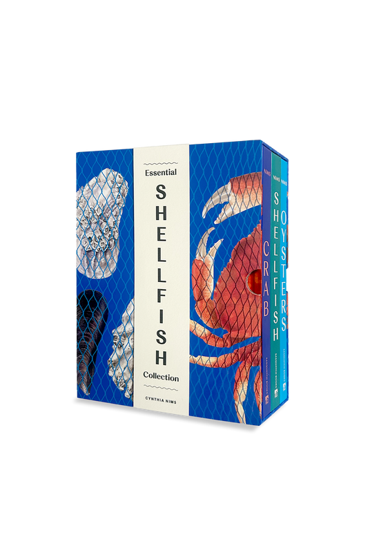 Box packaging for 'Essential Shellfish Collection' with shell and crab illustrations on a white background