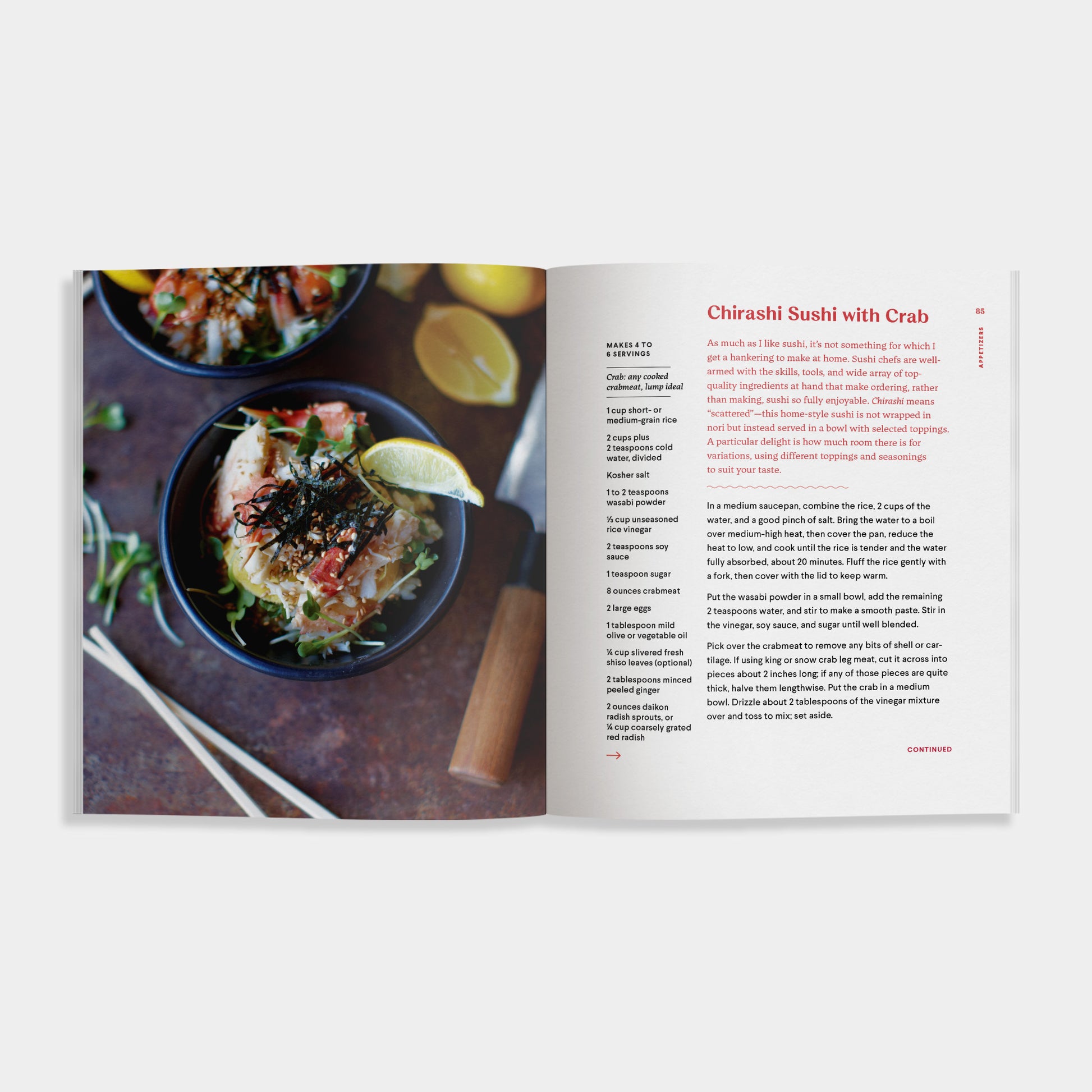 Open cookbook of 'Crab' showing a recipe for Chirashi Sushi with Crab