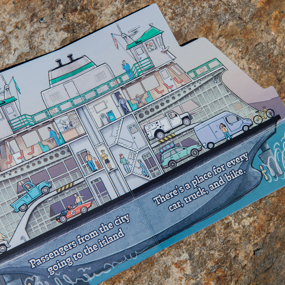Open book of Working Boats Ferry showing a cross section view of the inside of a ferry where passengers are driving in. 