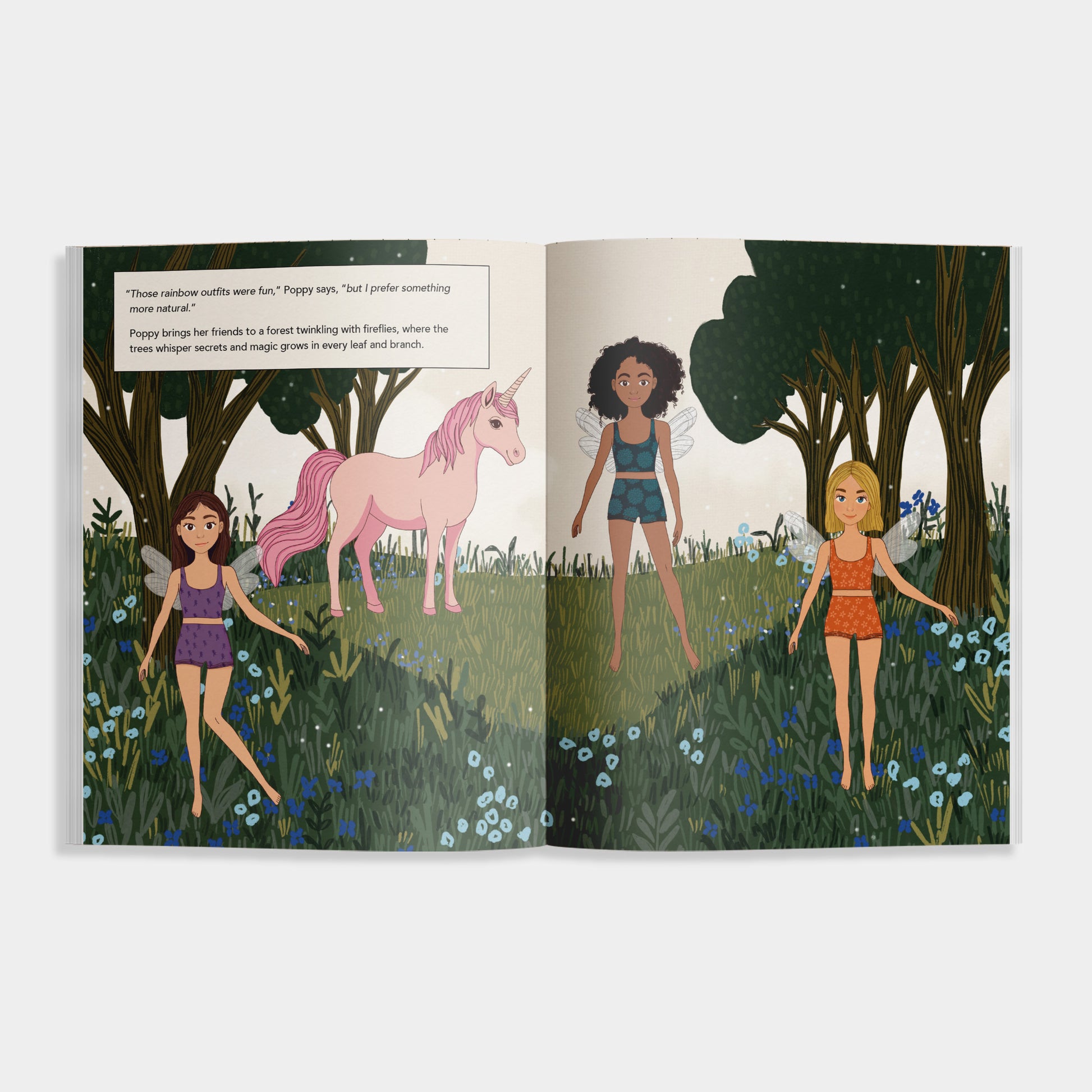 Interior pages of “My Sticker Storybook: Fairies & Unicorns” showing three illustrated fairies and a pink unicorn in a magical forest scene with wildflowers and trees, accompanied by a short story excerpt
