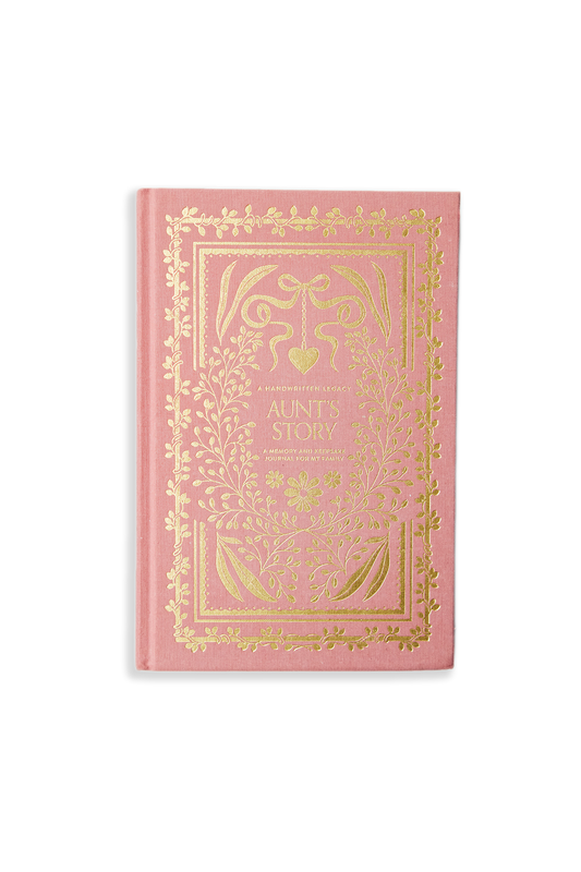 Pink book with gold decorative elements on a white background