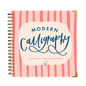Calligraphy practice workbook with pink striped cover on a white background