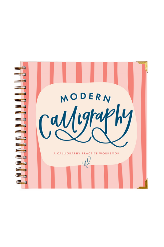 Calligraphy practice workbook with pink striped cover on a white background