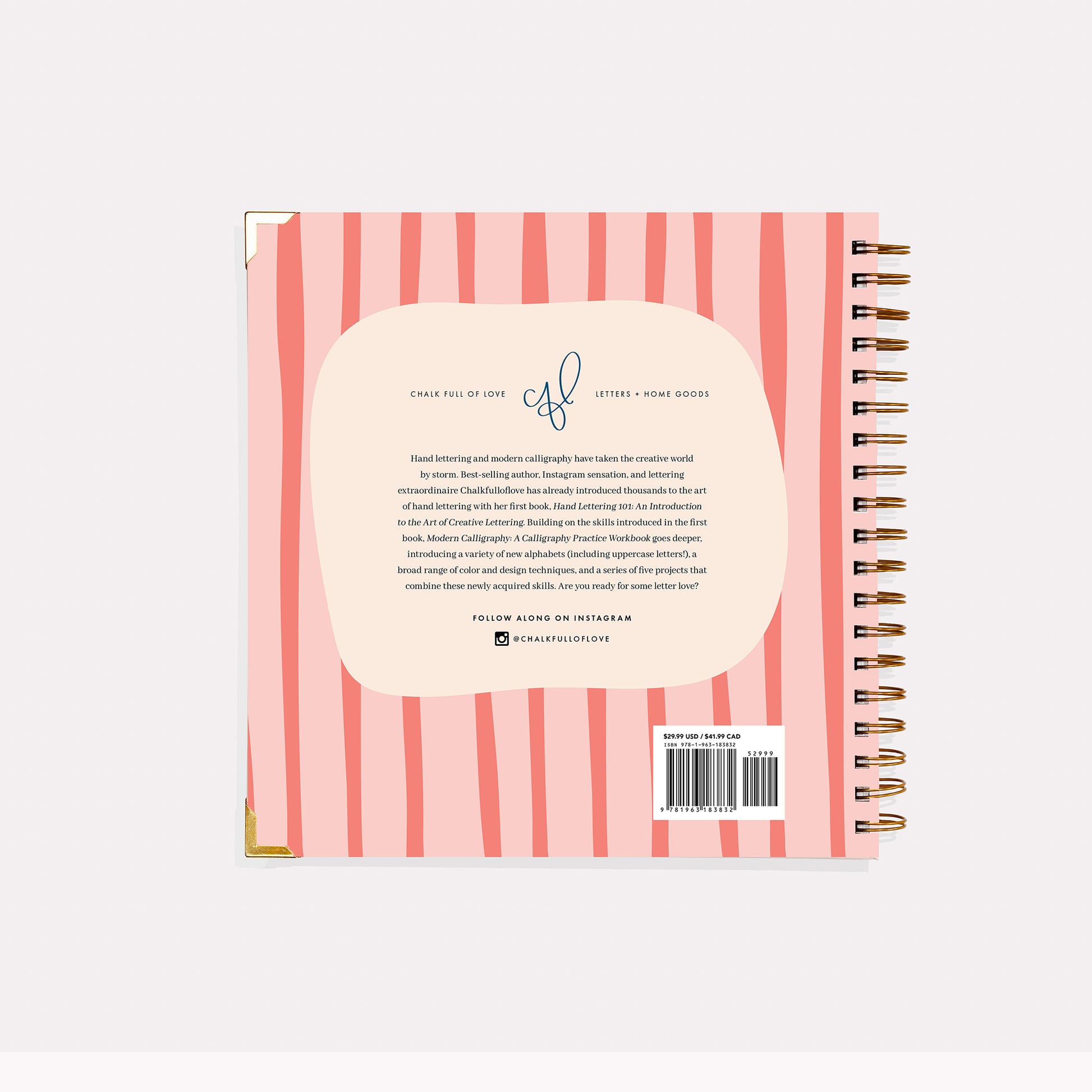 Back cover of a spiral-bound notebook with pink and white striped design and text.