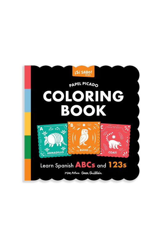 Die Cut coloring book with a black bacground and colorful Papel Picado images on the cover. 