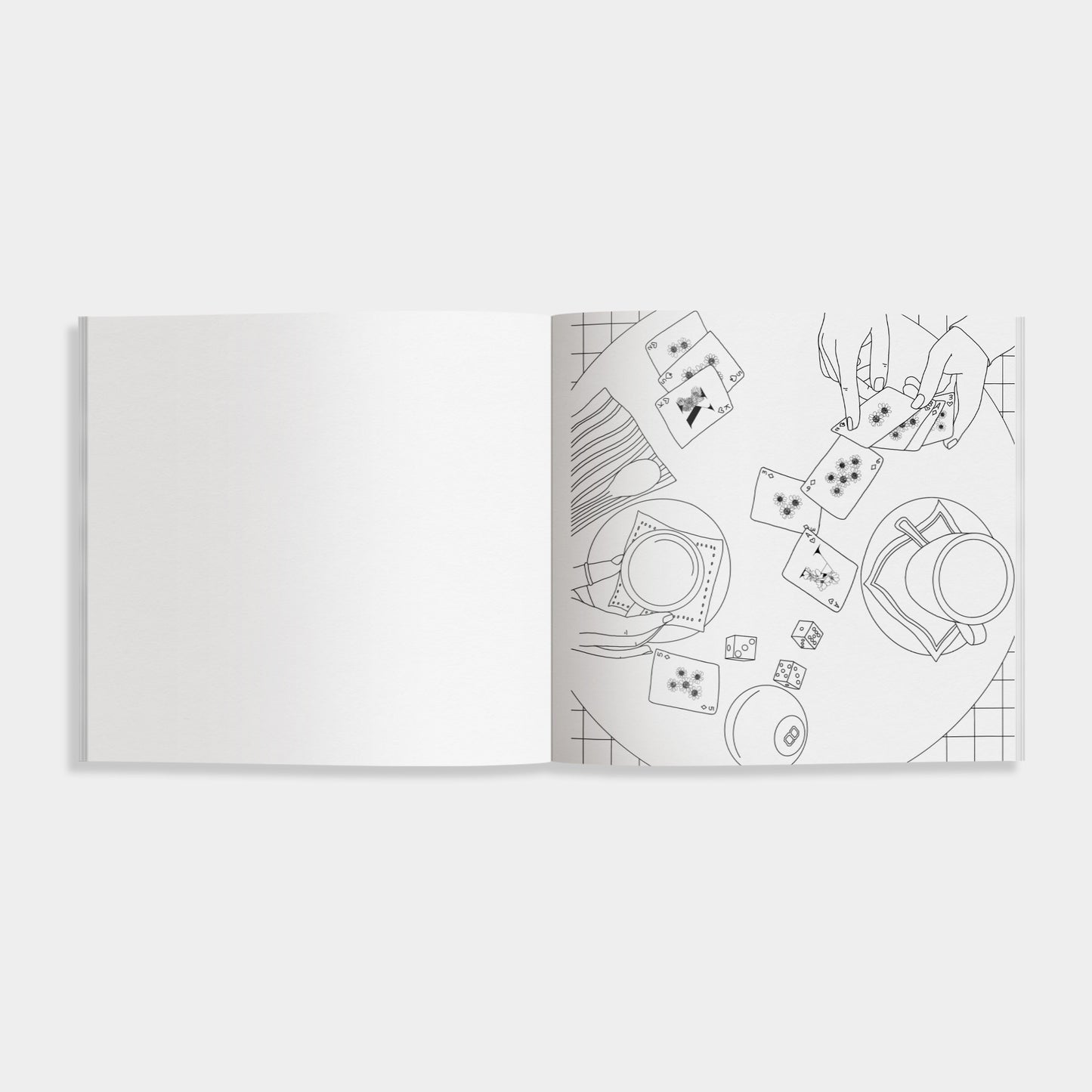 Two white notebooks with black line art on a light gray background