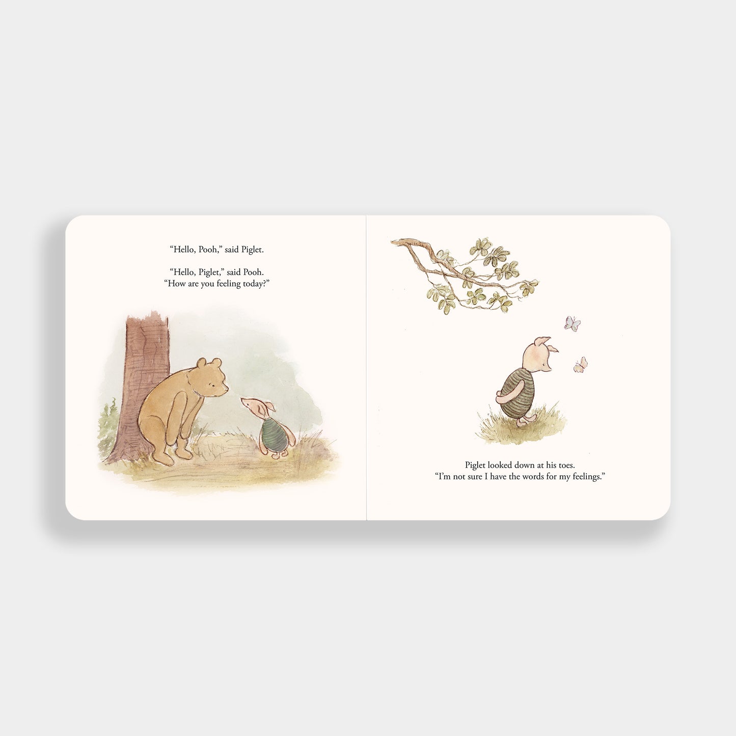 Illustrated book page with two animals in a natural setting