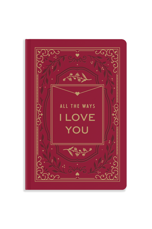 A red hardcover notebook with gold foil-style ornamental border details and the text 'ALL THE WAYS I LOVE YOU' printed in gold in the center, shown on a plain white background.
