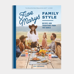 Book cover of 'Five Marys Family Style' with a family at a table outdoors.