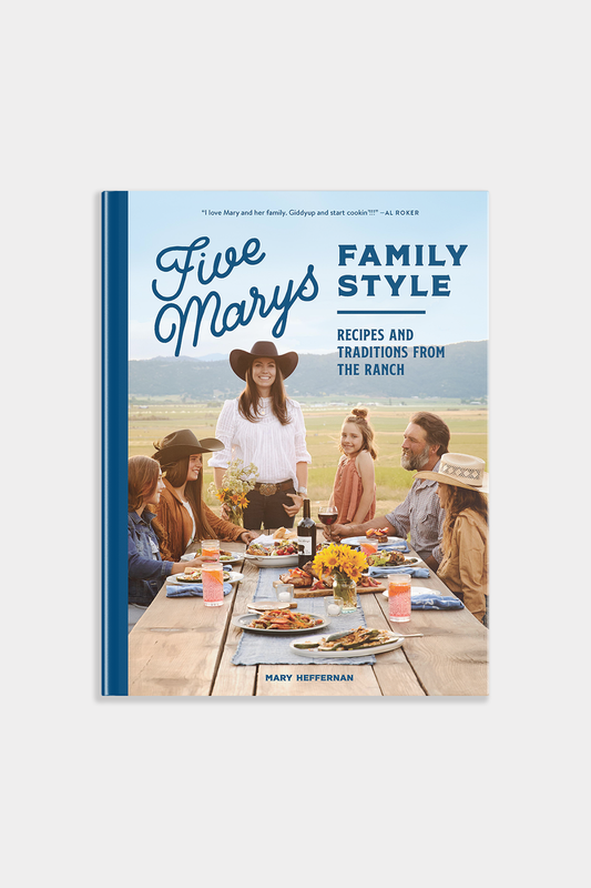 Book cover of 'Five Marys Family Style' with a family at a table outdoors.