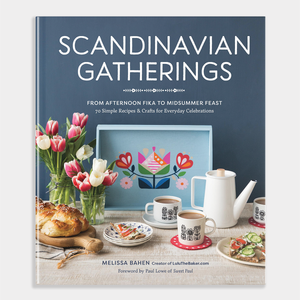 Book titled 'Scandinavian Gatherings' with a table setting on the cover