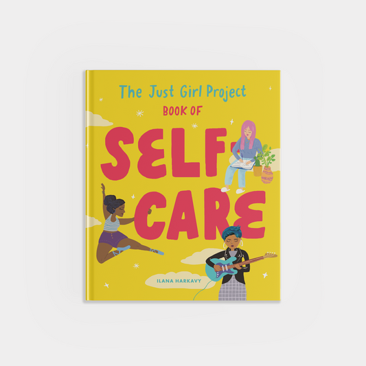 Book titled 'The Just Girl Project Book of Self Care' on a yellow background